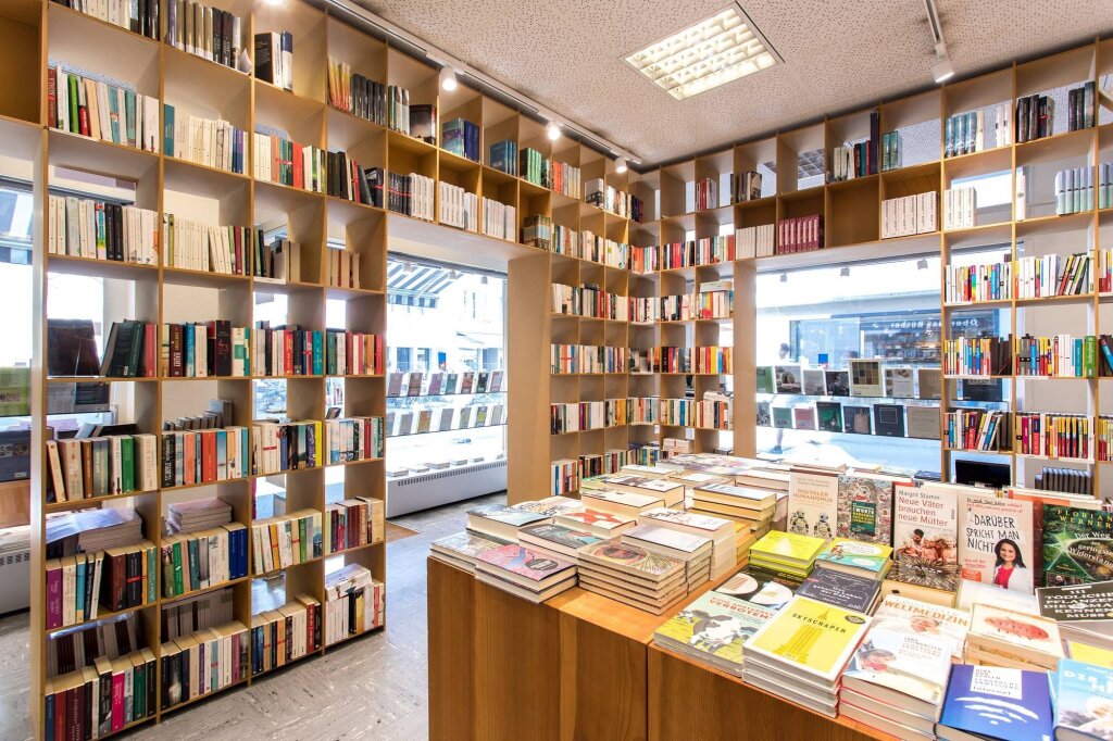 Книга my shop. Книжный магазин. Книжный магазин фон. Подписные издания. Красивый фон прилавок книжного магазина.