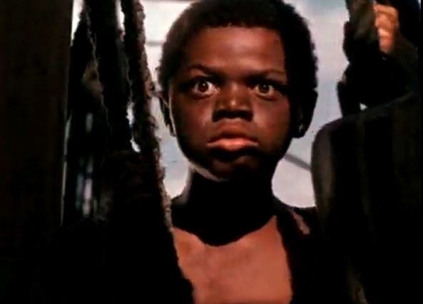 Спасенный русскими матросами негритёнок, оказался на редкость смышленым и добрым. Однажды ему удается спасти матроса... 1953г Фильм?