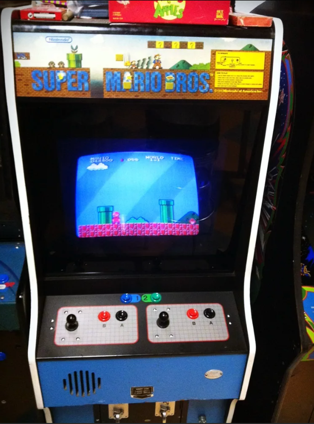 Mario arcade. Аркадный автомат Марио. Игровой автомат super Mario Bros. Марио с автоматом. Arcade Cabinet Mario.