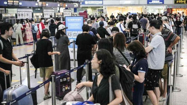 Возрождение группового туризма в Китае омрачено слабой экономикой